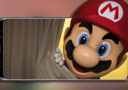Mario peeking Nintendo