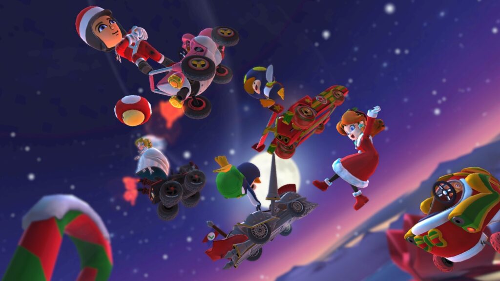 The featured image for our Best Android Christmas updates article, featuring a promotional image from Mario Kart Tour. In the picture, a plethora of Mario Kart characters, such as Daisy, are flying off their karts in the night sky.