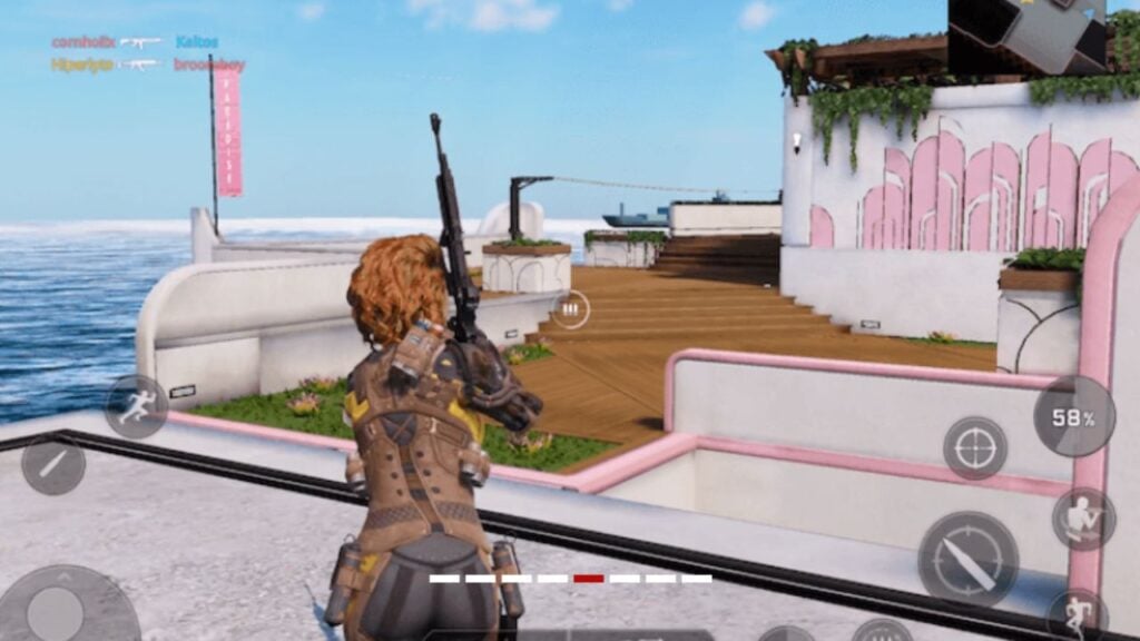 Feature image for our Rogue Company Elite Android news. It shows a screenshot from the game, with the player moving around and reloading a weapon.