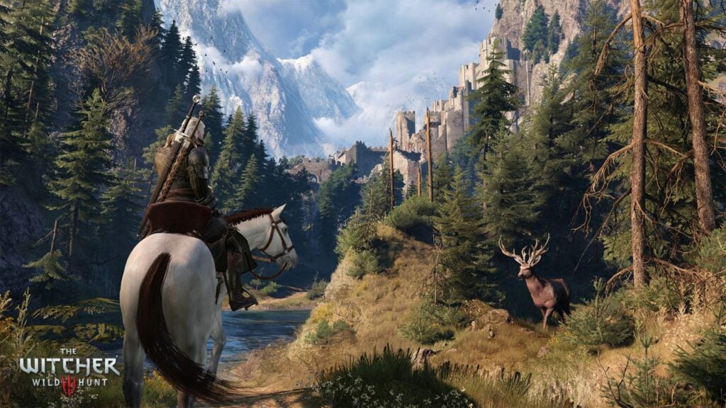 The feature image for The Witcher 3 Android news piece. It shows a screenshot from The Witcher 3 with Geralt riding along the edge of a mountain valley on his horse.