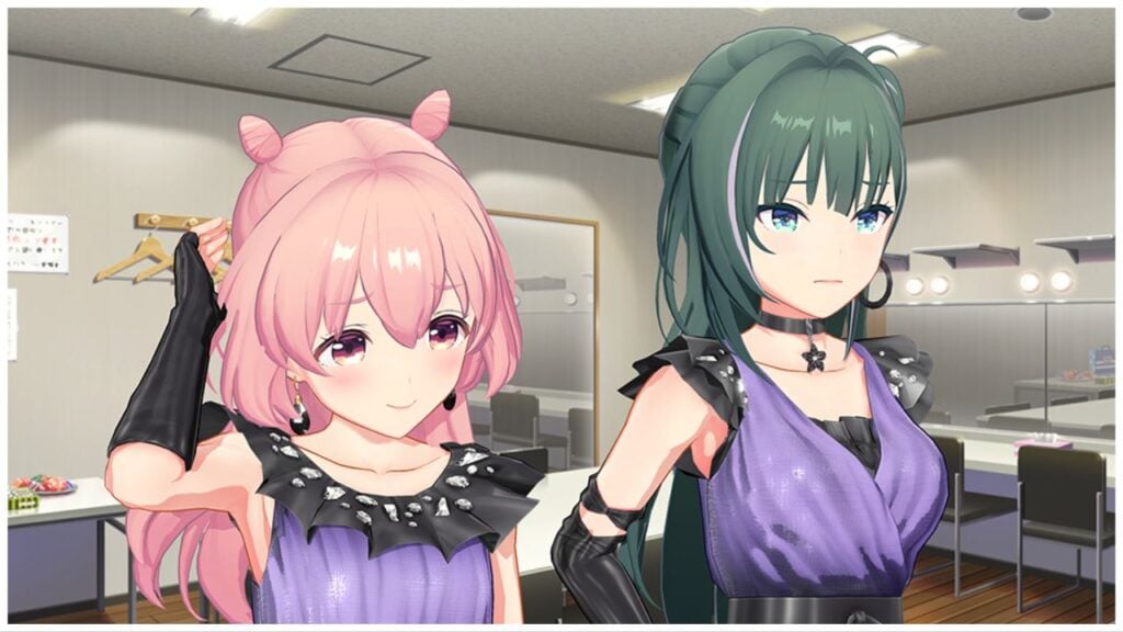 feature image for our idoly pride global release news, the image features an official promo screenshot from the game of two idol characters wearing stage outfits with sheepish expressions on their face, one character is blushing and holding her hand up to her head as they both stand in a dressing room