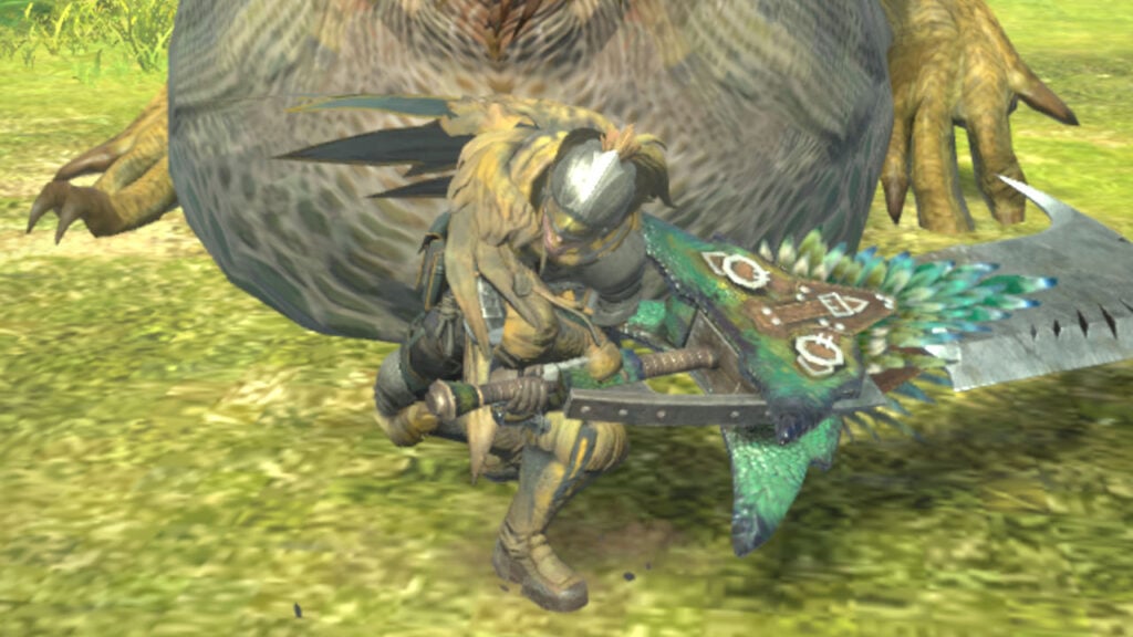 A character attacks a Great Jagras with a Great Sword.