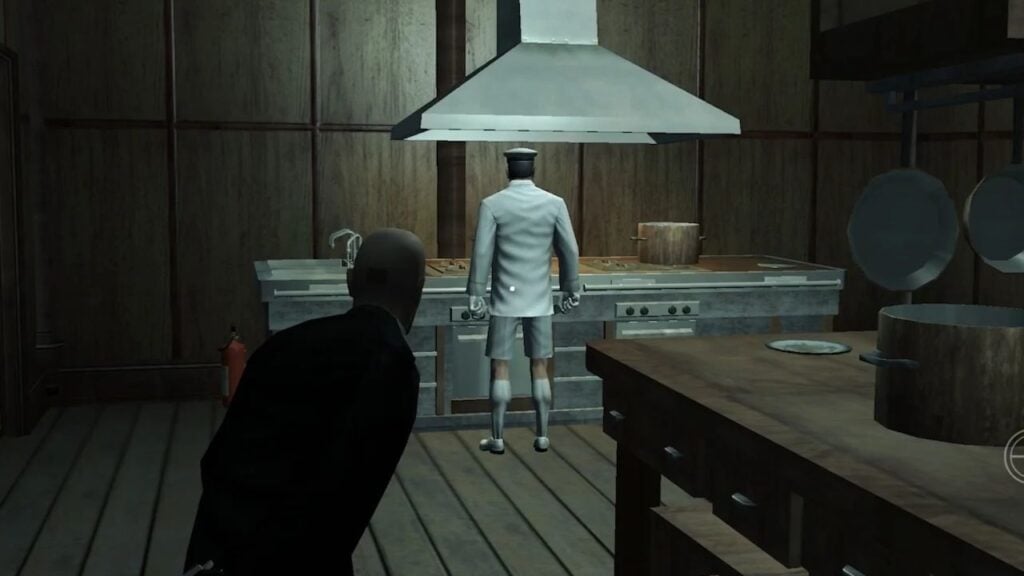 Feature image for our best new Android games this week. It shows a screenshot from Hitman: Blood Money Reprisal, with the player character, Agent 47, creeping up on a man in a kitchen.