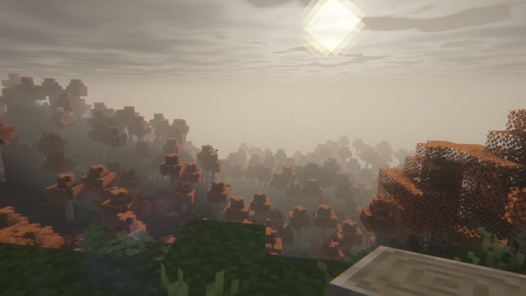 Feature image for our Minecraft server list news. It shows a screenshot from a Minecraft version with a shader pack, showing a misty valley full of trees with orange leaves.