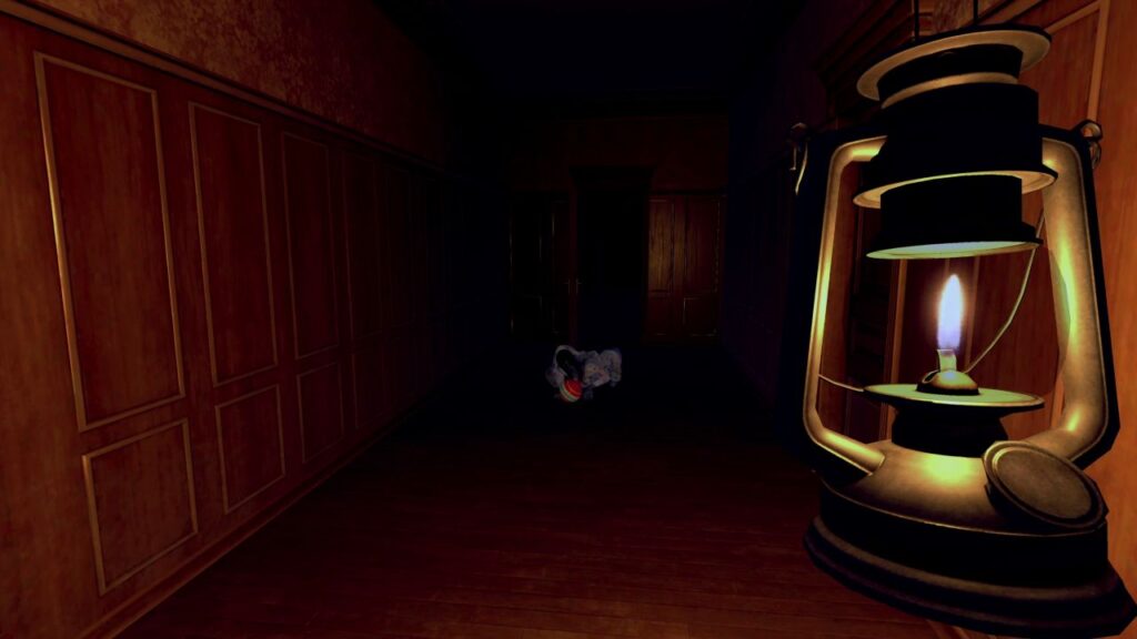 Feature image for our Deadly Nightmare: Unwanted Heritage. It shows an in-game screen of the player character holding a flame lantern in a corridor as a creepy figure crawls along the floor toward them.