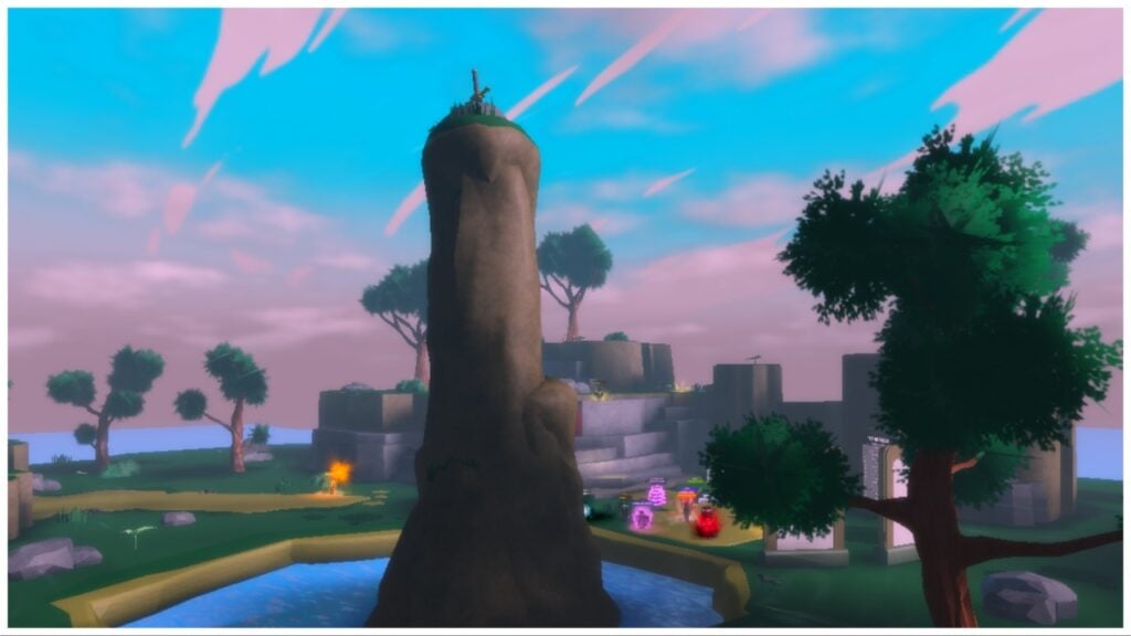 The image shows a scenery shot in game of a large stone pillar in the centre of the map with a sword in the dead centre. The sky is a blend of blue and pink with trees surrounding the map and lush greenery