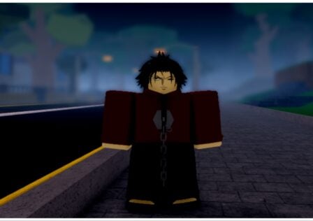 Feature image for our Project Mugetsu Resurrection Tier List which shows a male avatar with a scarred face and moody expression as he stands in a street at nighttime. He has black hair and a red dress shirt with black pants and tie