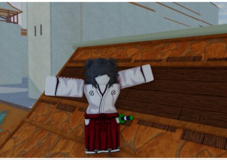 Feature image for our Type Soul Theatre Guide. The image shows my avatar with both arms outstretched either side, she is wearing the default soul reaper outfit which is a white shirt with red pants and a katana equipped to her waist. She is stood on an orange rooftop with a large white wall seen in the background