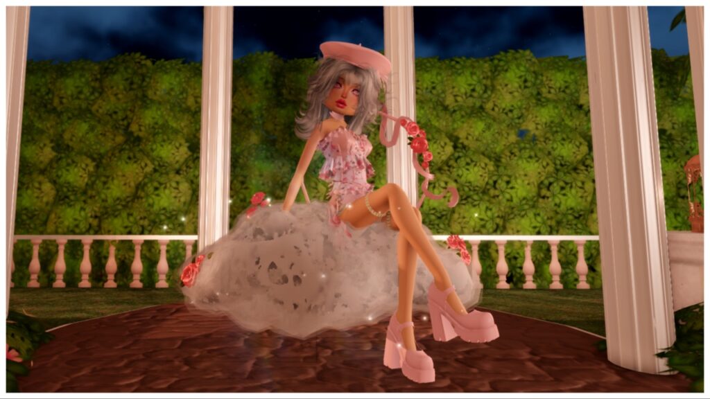 Feature image for our dress to impress valentines update quest guide showing a player dressed in pink frills sitting on a cloud with roses on it looking to the viewer with a slightly tilted head in a dreamy setting