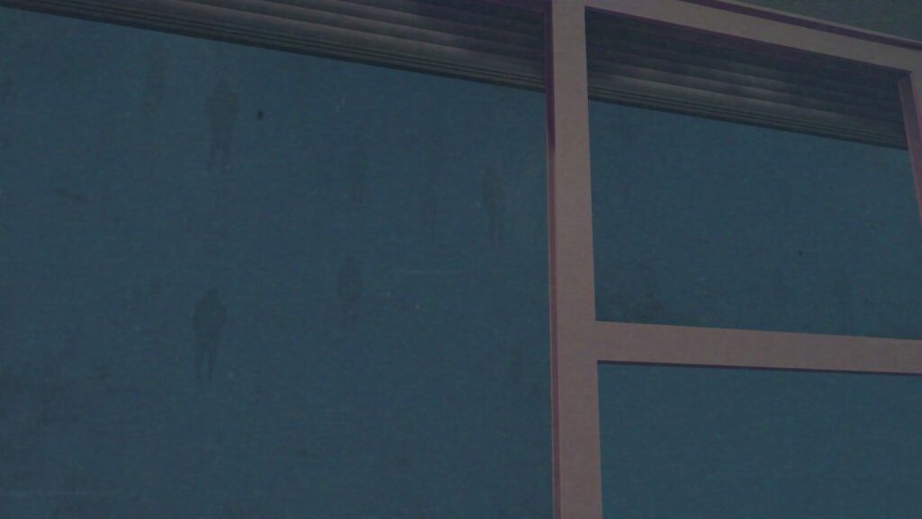 Feature image for our guide on the Scary Shawarma Kiosk The Anomaly Fog event. It shows a view through the kiosk window in-game. The sky is covered by a blue fog, and strange dark humanoid figures float in the air in the fog.
